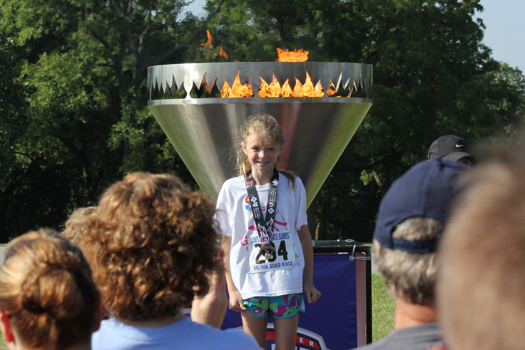 Photo of awards ceremony at the Sunflwoer State Games Cauldron 5K and 10K.