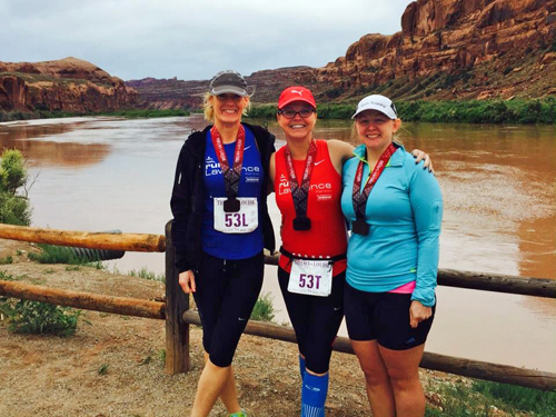 Photo of LaRisa Chambers and friends at the Thelma and Louise Half Marathon.