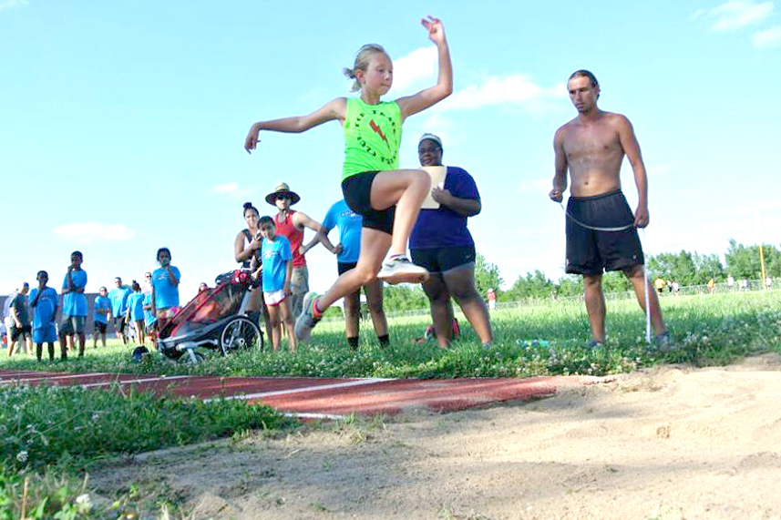 Photo of the long jump competition at the Mini Mocs vs TBC Track Club meet.