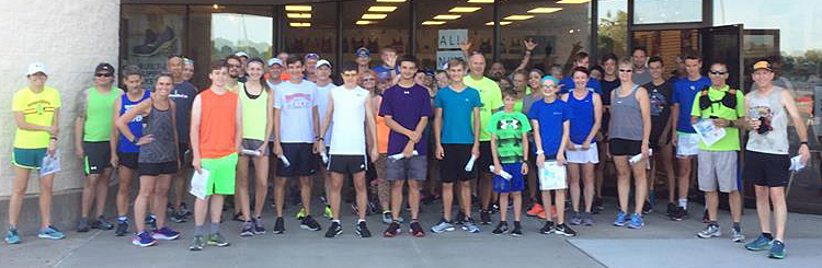 Photo of the group in front of the Topeka Garry Gribble's Running Sports store before the "As the Crow Flies Run."