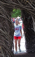 Photo of runner looking inside the Bird's Nest.