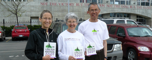 Photo of Karen Hyde, Dee Boeck and Gene Wee with awards at Lincoln.