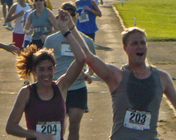 Libby & Tim Keogh crossing the finish line.