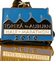 Photo of Topeka to Auburn Half Marathon finsiher's medal.