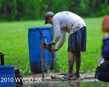 Photo of washing shoes after run.