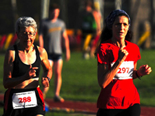 Photo of Dee Boeck and Anna Allen at the Heartland Masters T&F 3000m.