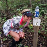 Photo of Tesa Green at mile 99 at the Hawk 100.