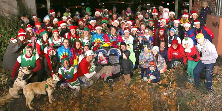 Photo of the 2016 Jingle Jog through downtown Lawrence.