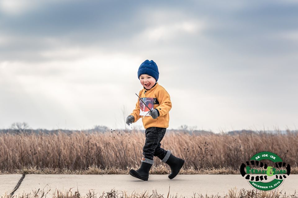 Photo of happy young boy at the Donate & Dash Run, December 14, 2019.