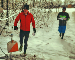 Photo of Carl Specking approaching the 2nd control on the short course.